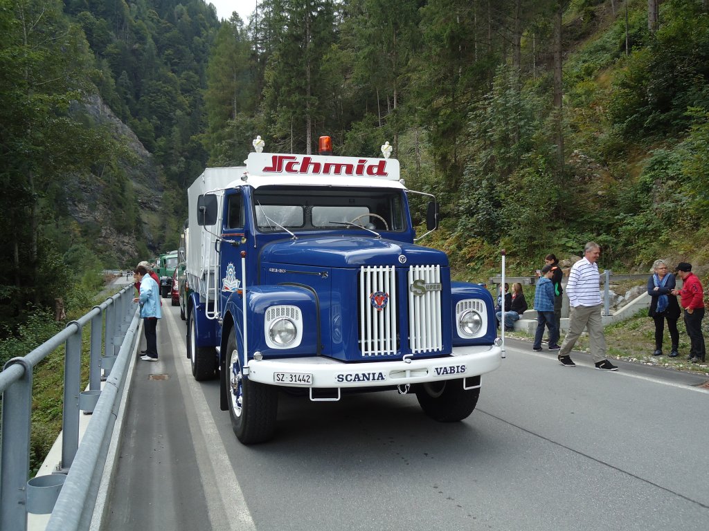 (129'869) - Schmid, Bch - SZ 31'442 - Scania am 18. September 2010 bei Valendas