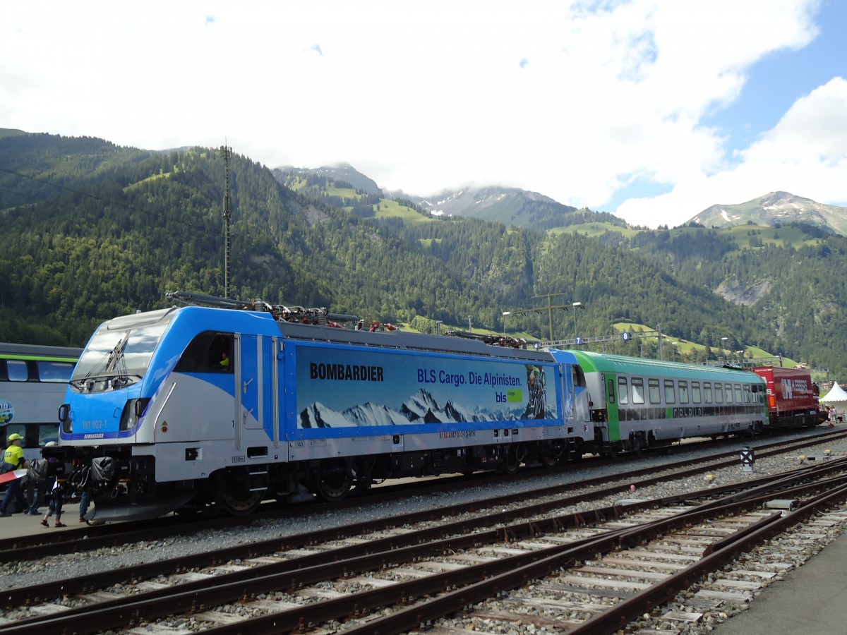 (145'575) - Bombardier-Lokomotive - Nr. 187'002-1 - am 30. Juni 2013 in Frutigen (100 Jahre BLS)