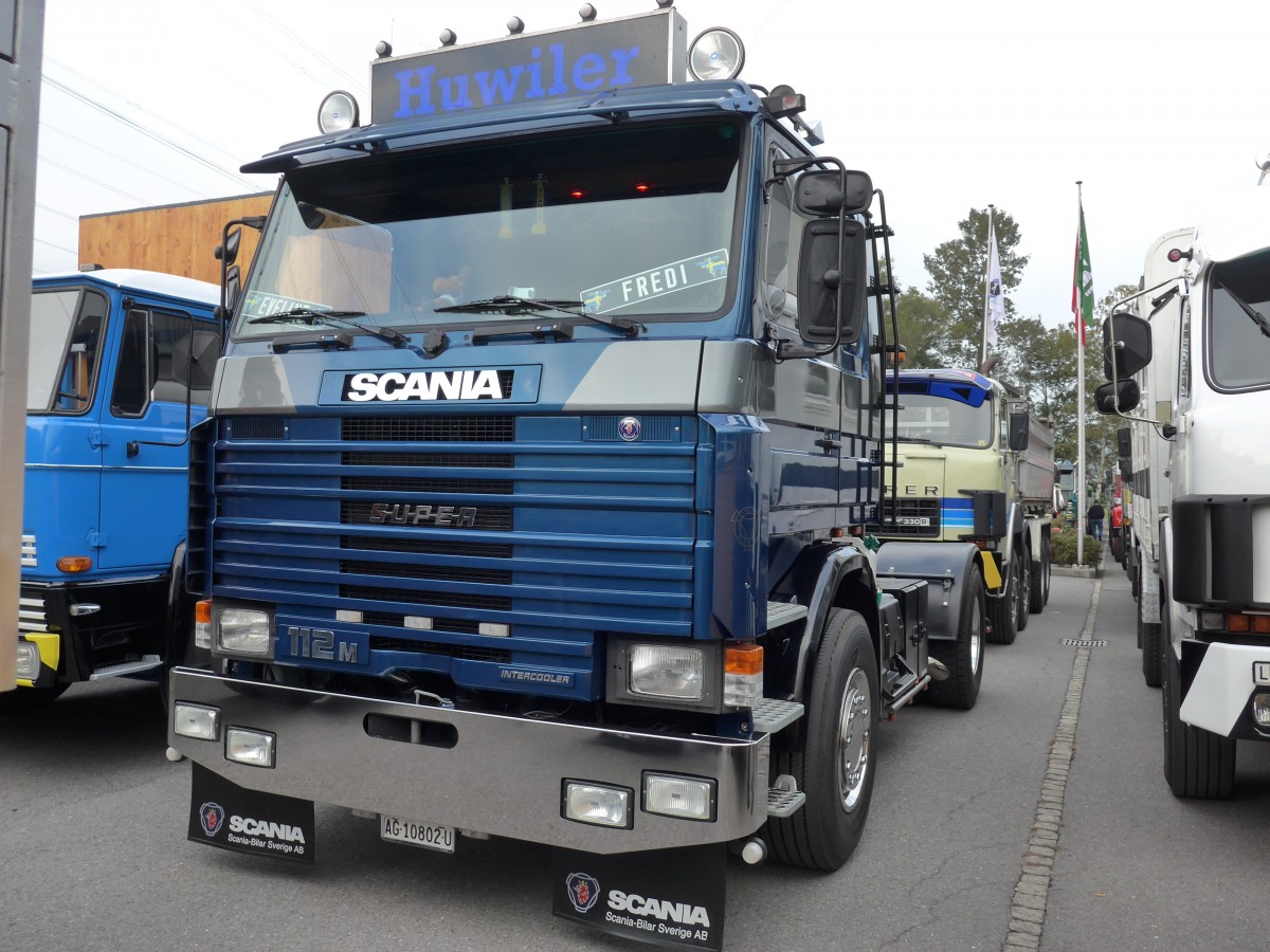 (166'098) - Huwiler - AG 10'802 U - Scania am 10. Oktober 2015 in Schnis, Bicoareal