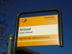 (137'001) - PostAuto-Haltestelle - Gstaad, Unter Gstaad - am 25. November 2011