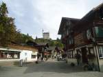 (147'385) Dorfstrasse in Gstaad mit Hotel Palace am 28. September 2013