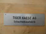 (136'246) - Schild  TIGER KAESE AG Schachtelksefabrik  im BrockiShop am 28. September 2011