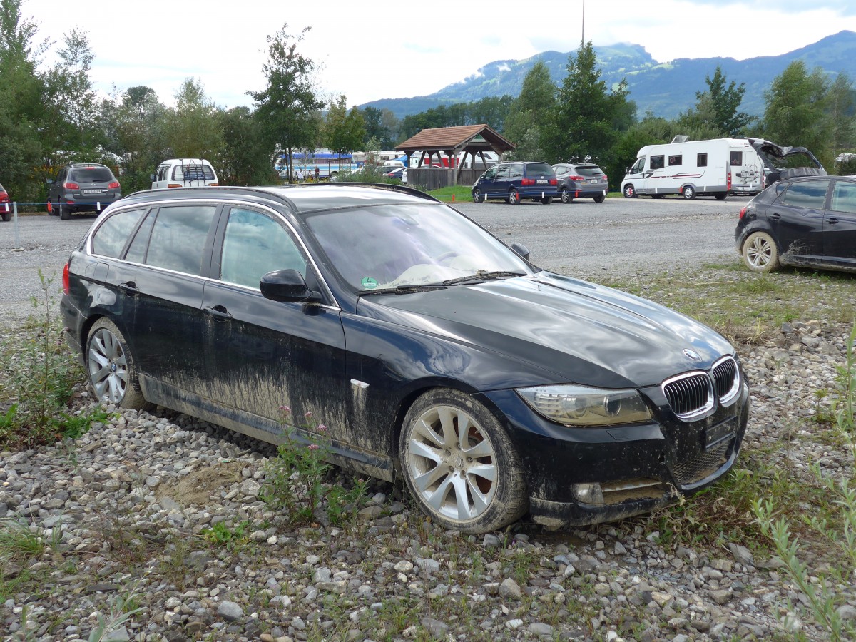 (153'887) - BMW am 16. August 2014 nach dem Unwetter in Altsttten, Allmendplatz