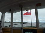 (191'274) - Auf dem Motorschiff Ernest Kemp mit der neuseeländischen Flagge für Schiffe am 24.