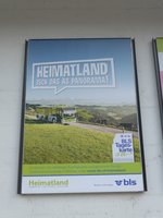 (170'387) - BLS-Plakat - HEIMATLAND - am 7. Mai 2016 beim Bahnhof Oey-Diemtigen